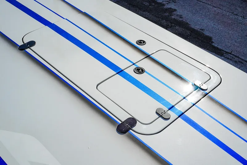 Slide: The Image of Hatch on 2026 Statement 396 boat with blue stripes and secure latches. - 45