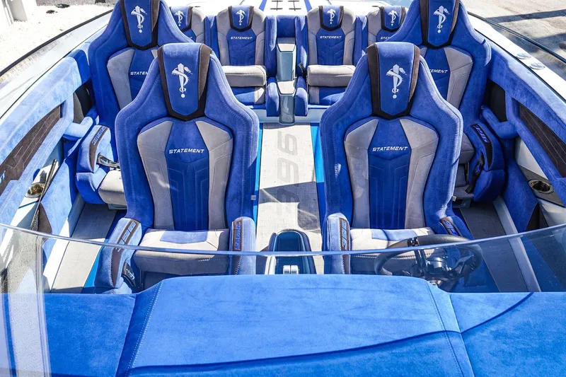 Slide: The Image of Luxurious blue and gray interior of 2026 Statement 396 boat with plush seating. - 47