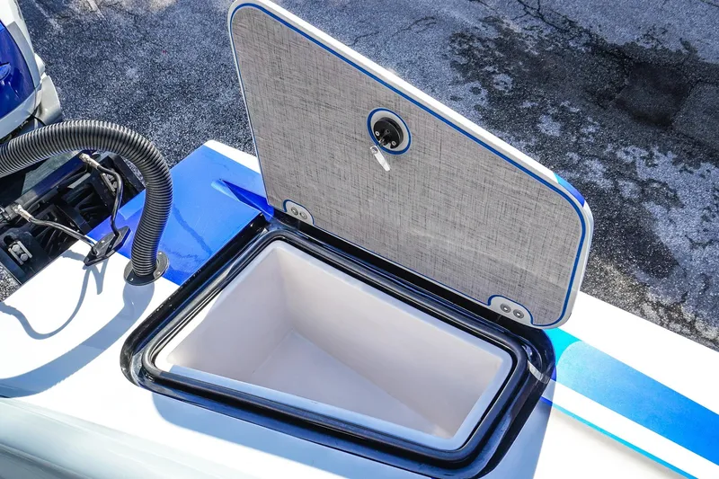 Slide: The Image of Open storage compartment on a 2026 Statement 396 boat, featuring a sleek design. - 52