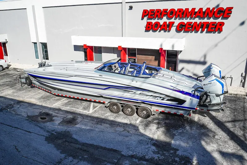 Slide: The Image of 2026 Statement 396 powerboat at Performance Boat Center, featuring twin outboard engines. - 6