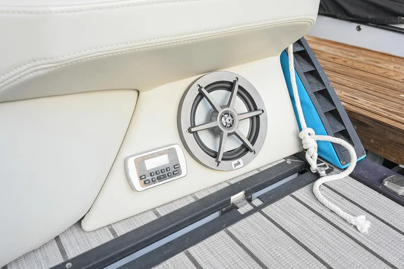Slide: The Image of 2023 Montara 25 Monntara 2.0 boat interior with speaker and control panel. - 16