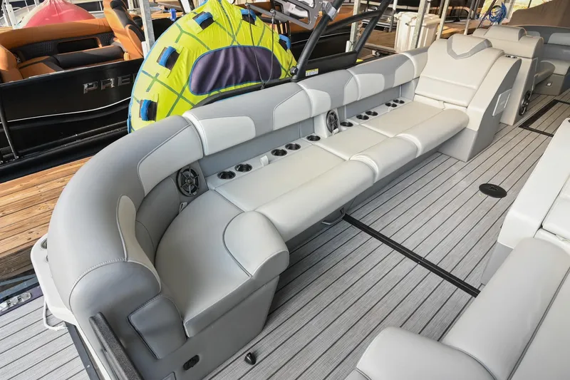 Slide: The Image of Luxurious seating on 2023 Montara 25 Monntara 2.0 boat with sleek design and cup holders. - 21