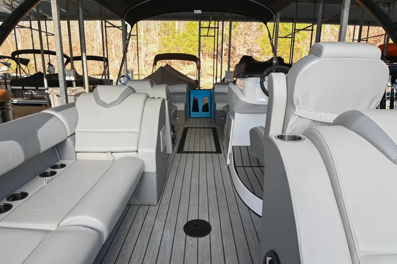 Slide: The Image of 2023 Montara 25 Monntara 2.0 boat interior with sleek seating and modern design. - 25