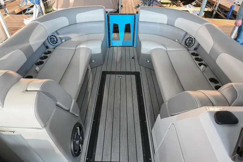 Slide: The Image of 2023 Montara 25 Monntara 2.0 boat interior with gray seating and modern design. - 34