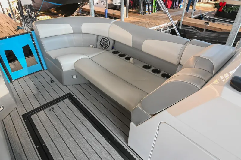 Slide: The Image of 2023 Montara 25 Monntara 2.0 boat interior with gray seating and cup holders. - 39