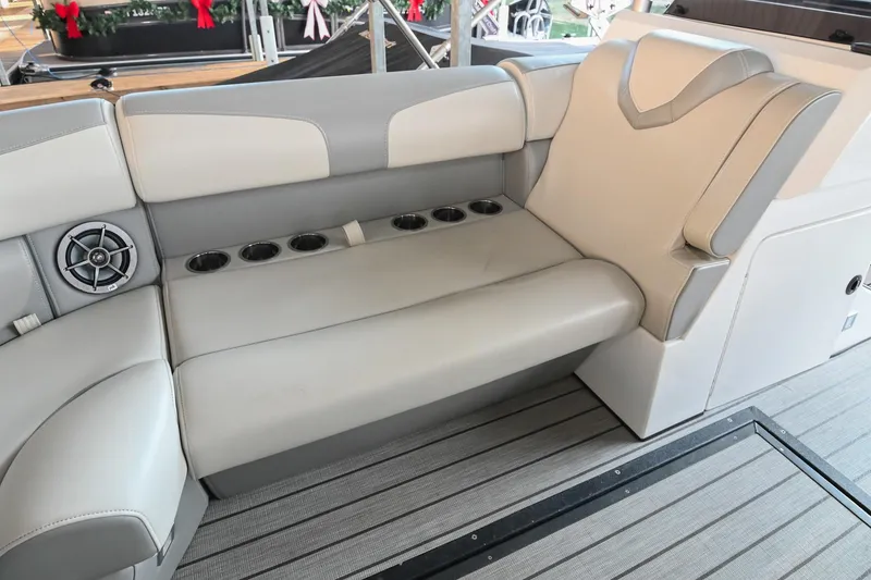 Slide: The Image of Luxurious seating in 2023 Montara 25 Monntara 2.0 boat with cup holders and speaker. - 40