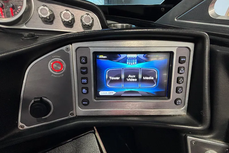 Slide: The Image of 2017 MasterCraft X46 dashboard with touchscreen controls and start/stop button. - 39