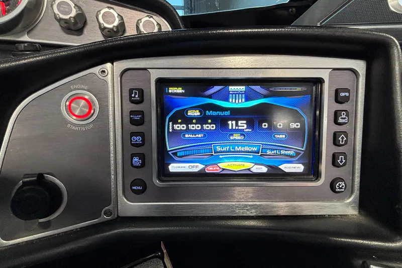 Slide: The Image of 2017 MasterCraft X46 dashboard with touchscreen controls and engine start/stop button. - 41