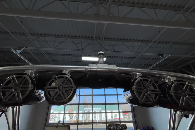Slide: The Image of 2017 MasterCraft X46 boat speakers and tower in a showroom setting. - 47