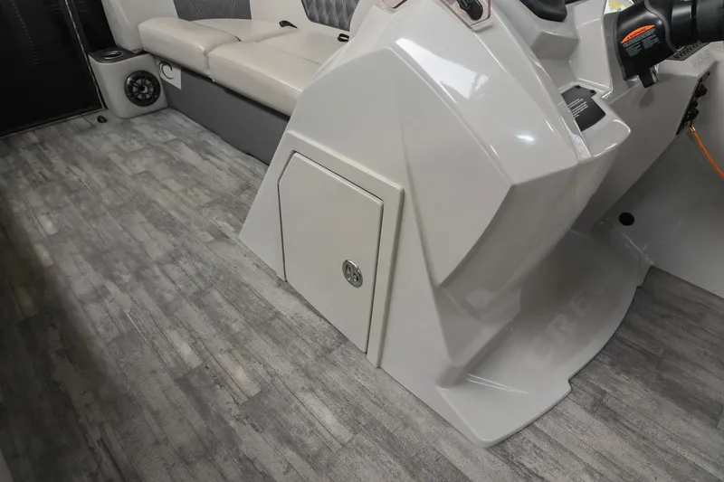 Slide: The Image of Interior of 2021 Crest Classic DLX 220 L boat with seating and control panel. - 31