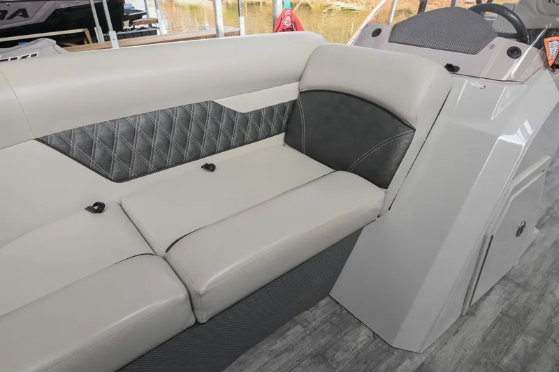Slide: The Image of 2021 Crest Classic DLX 220 L boat interior with luxurious seating and modern design. - 39