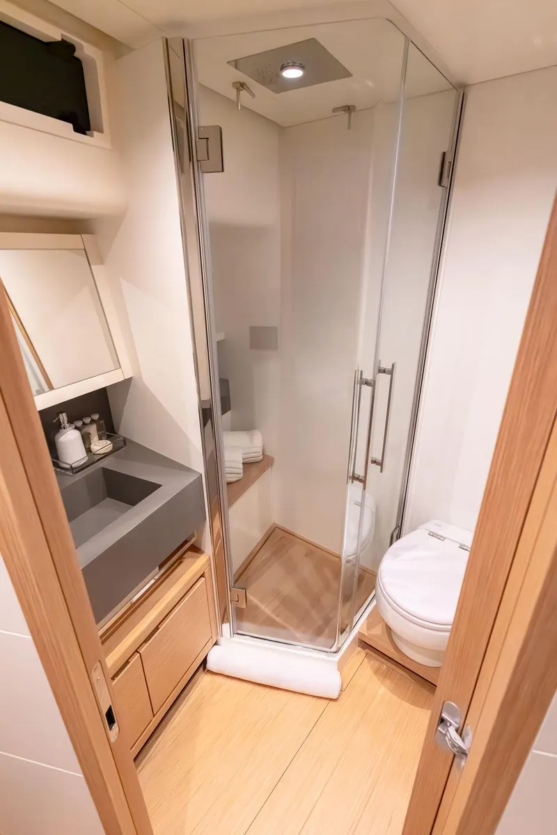 Slide: The Image of Modern bathroom in 2023 Pardo Yachts Endurance 60 with shower, sink, and toilet. - 22