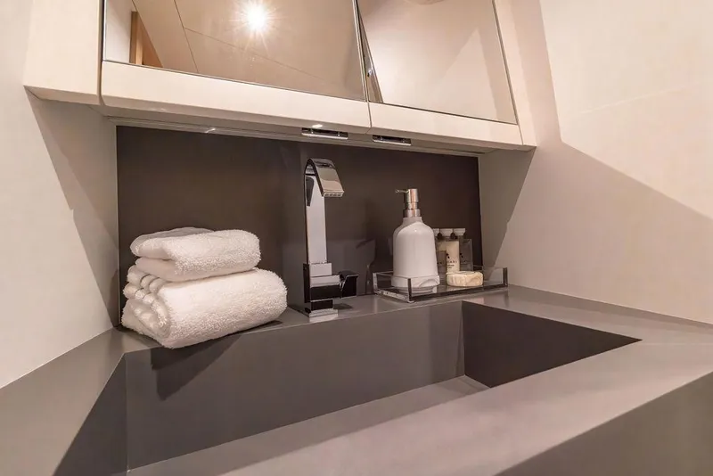 Slide: The Image of Luxurious bathroom sink area in 2023 Pardo Yachts Endurance 60, featuring modern fixtures and amenities. - 23