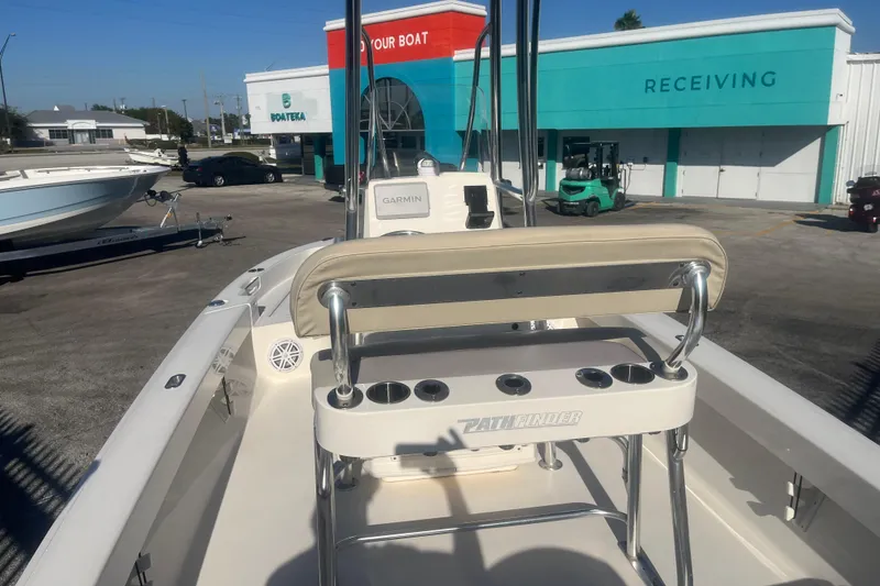 Slide: The Image of Pathfinder 2005 TRS boat at dealership, featuring Garmin equipment, 2022 model. - 7