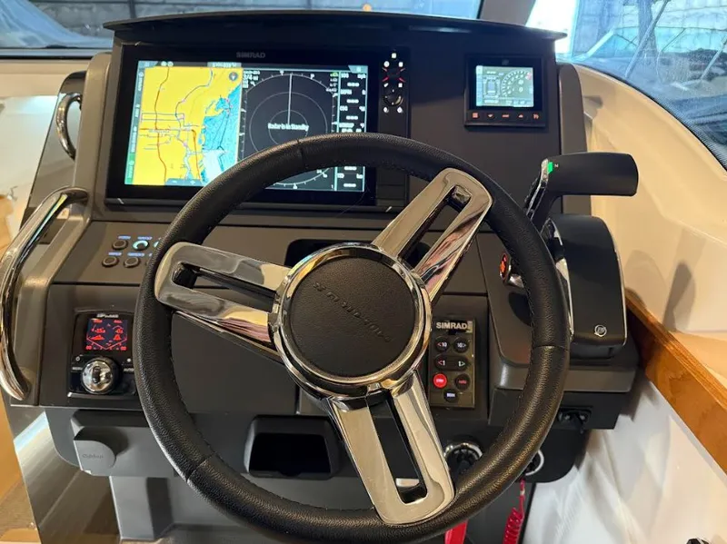 Slide: The Image of Nimbus Weekender 9, 2024 helm with navigation system. - 13