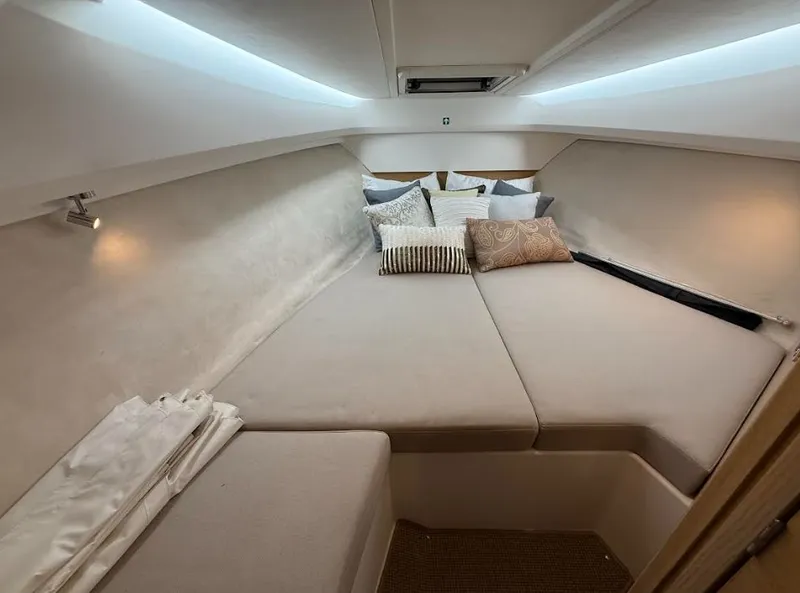 Slide: The Image of Interior of 2024 Nimbus Weekender 9 with cozy bed and pillows. - 16