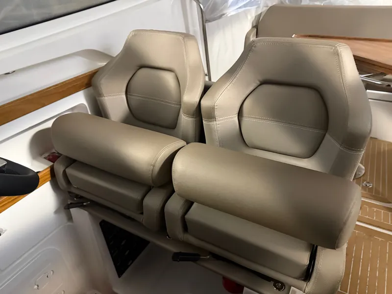 Slide: The Image of Interior of Nimbus Weekender 9, 2024, featuring beige seats. - 9