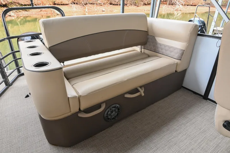 Slide: The Image of Luxurious seating on 2022 Crest Classic DLX 220 pontoon boat with cup holders. - 14