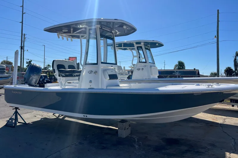 The Image of 2026 Tidewater 2210 Carolina Bay boat displayed outdoors under clear blue sky. - 0