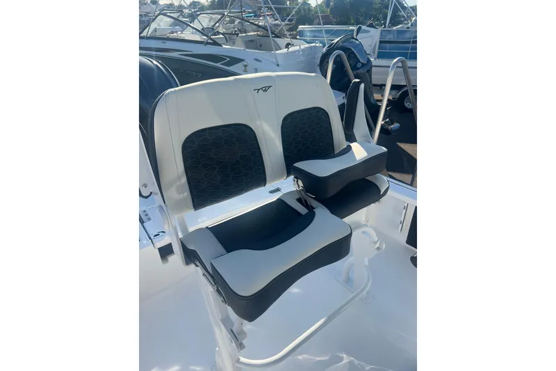 Slide: The Image of 2026 Tidewater 2210 Carolina Bay boat seats with modern design and comfortable cushioning. - 16