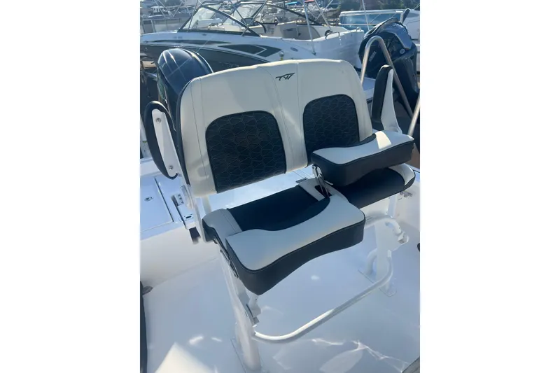 Slide: The Image of 2026 Tidewater 2210 Carolina Bay boat seats with modern design and comfortable cushioning. - 17