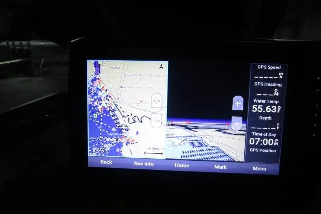 Slide: The Image of GPS navigation screen on a 2005 Sea Ray 290 Amberjack boat, displaying map and data. - 20