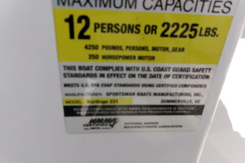 Slide: The Image of 2014 Sportsman Heritage 241 Center Console capacity label, 12 persons or 2225 lbs, 250 HP motor. - 14