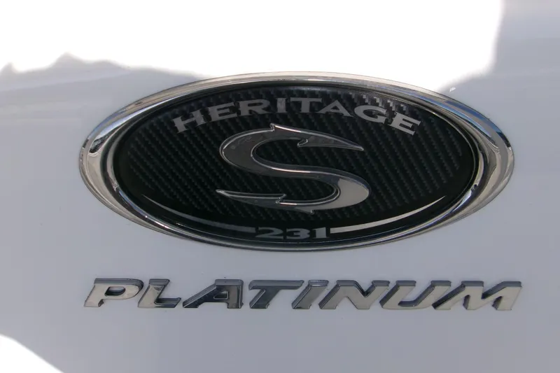 Slide: The Image of 2014 Sportsman Heritage 241 Center Console emblem with "Platinum" badge. - 17