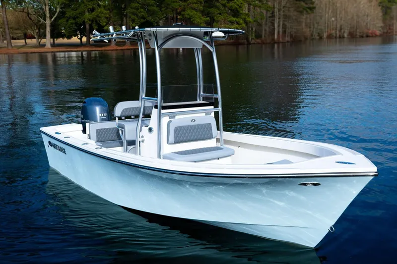 Slide: The Image of Manufacturer Provided Image: 2025 Defiance CATALINA 190 boat on calm lake waters, showcasing sleek design and modern features. - 3