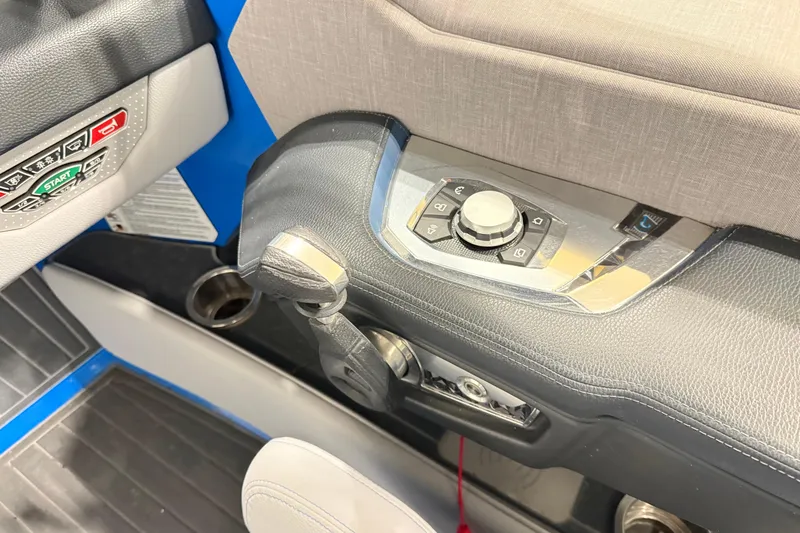 Slide: The Image of 2022 Nautique Super Air Nautique G25 Paragon control panel with start button and joystick. - 11