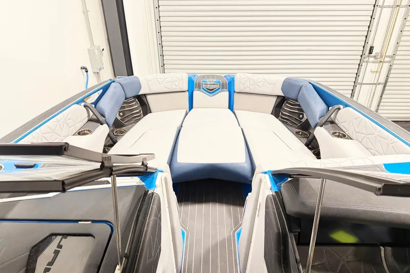 Slide: The Image of 2022 Nautique Super Air Nautique G25 Paragon interior with luxurious seating and modern design. - 12