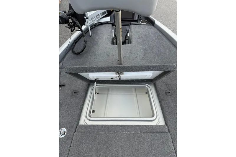 Slide: The Image of 2018 Phoenix 721 ProXP boat interior with open storage compartment. - 6