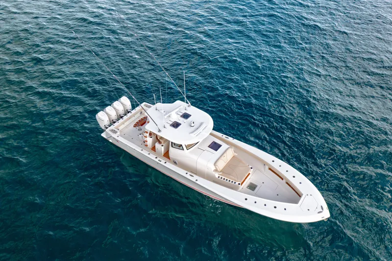 Slide: The Image of 2022 SeaVee 450Z boat on open water, aerial view. - 1