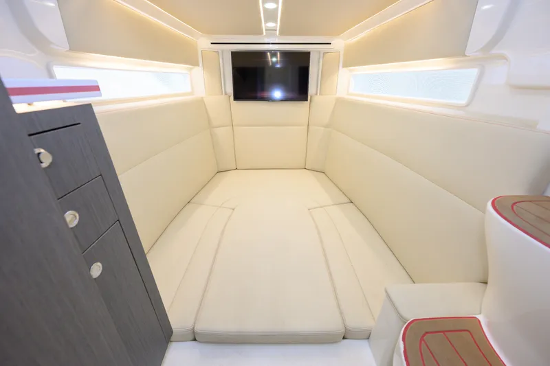 Slide: The Image of Luxurious interior of 2022 SeaVee 450Z boat with plush seating and modern amenities. - 18