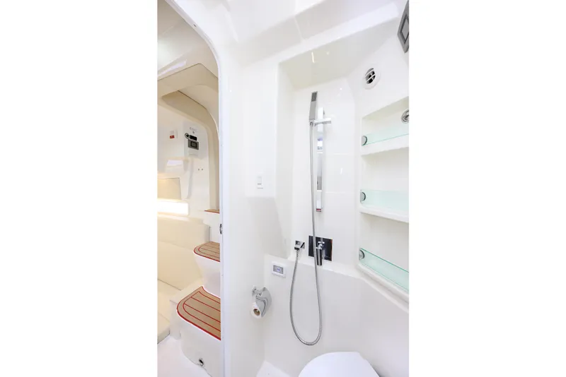 Slide: The Image of 2022 SeaVee 450Z boat interior with modern bathroom and shower design. - 23