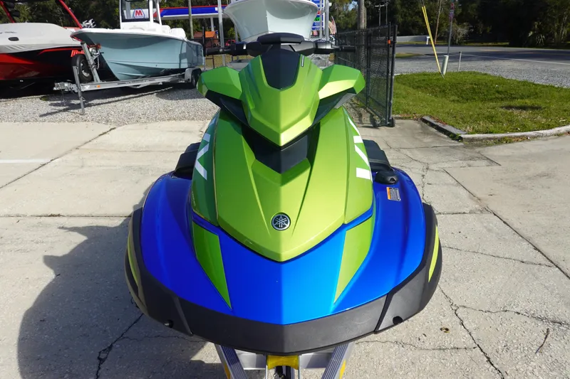 Slide: The Image of 2024 Yamaha WaveRunner VX Limited HO in vibrant green and blue, front view. - 3