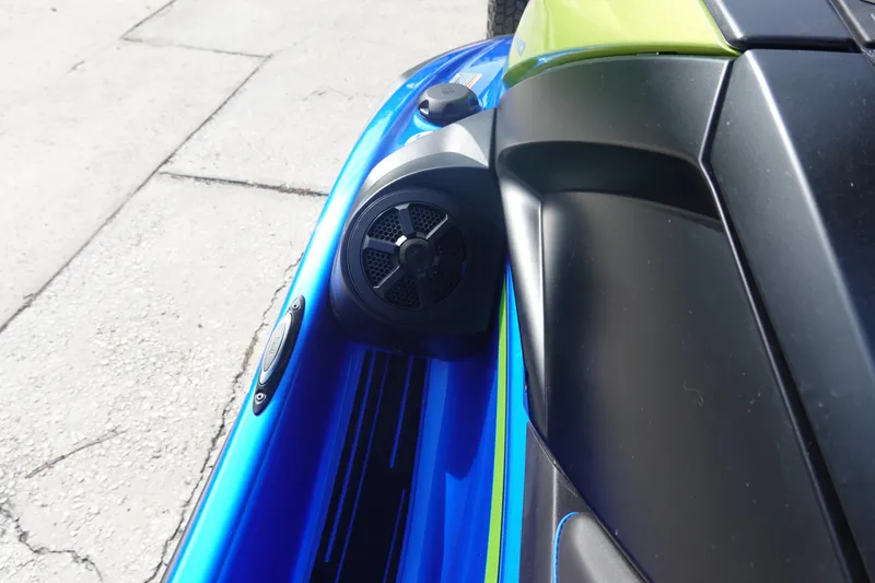 Slide: The Image of 2024 Yamaha WaveRunner VX Limited HO with speaker detail, blue and green accents. - 8