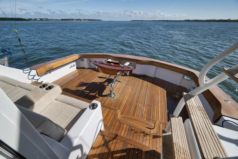 Slide: The Image of Ceiling view of 2015 Hatteras GT70 yacht with recessed lighting and ocean backdrop. - 25