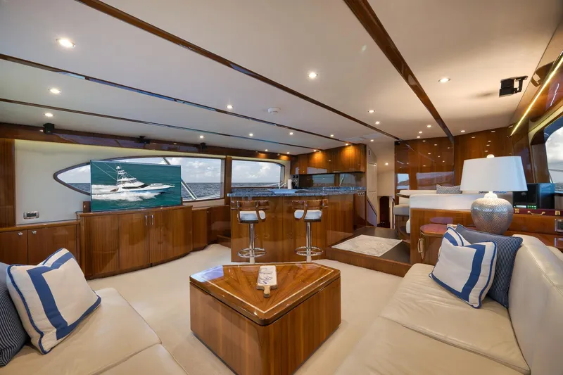 Slide: The Image of Luxurious interior of 2015 Hatteras GT70 yacht with elegant seating and modern design. - 27