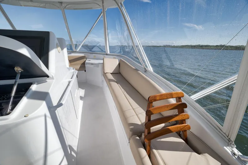 Slide: The Image of Interior view of 2015 Hatteras GT70 yacht with ocean backdrop. - 71
