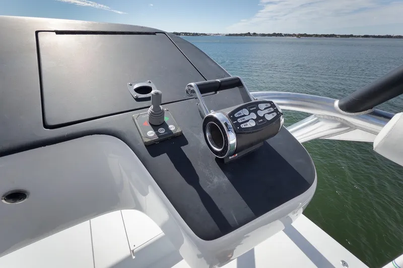 Slide: The Image of Helm of 2015 Hatteras GT70 yacht with Garmin navigation system on open water. - 79