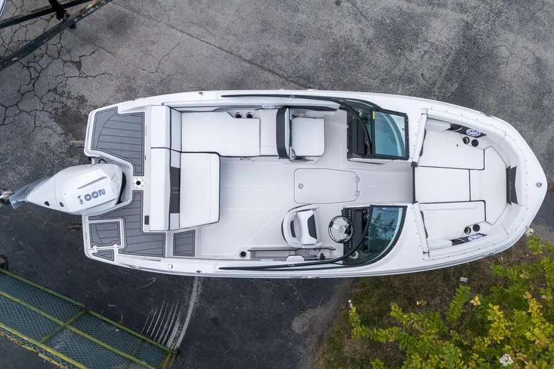 Slide: The Image of 2024 Monterey M-205 boat, aerial view, showcasing spacious seating and modern design. - 2