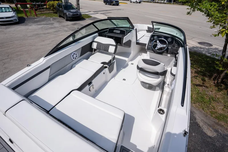 Slide: The Image of 2024 Monterey M-205 boat interior with sleek seating and modern dashboard design. - 3