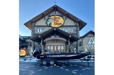 The Image of 2025 Tracker Savage 215 boat outside Bass Pro Shops Outdoor World. - 1