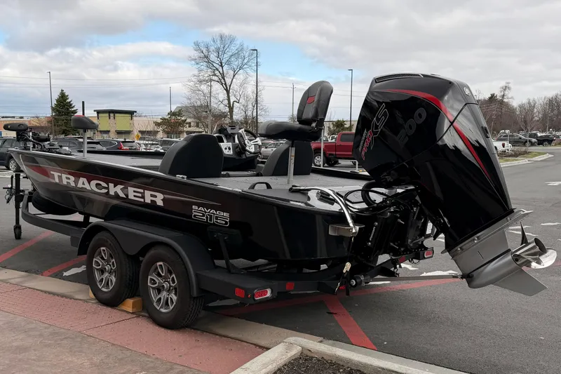 Slide: The Image of 2025 Tracker Savage 215 boat with powerful outboard motor on a trailer. - 9