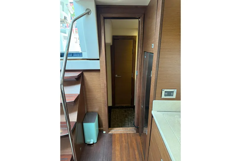 Slide: The Image of Interior of 2014 Sea Ray 470 Sundancer yacht with wooden finishes and modern design. - 77