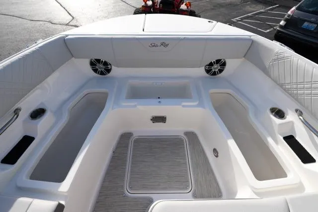 Slide: The Image of 2025 Sea Ray SDX 270 boat interior with spacious seating and modern design. - 11