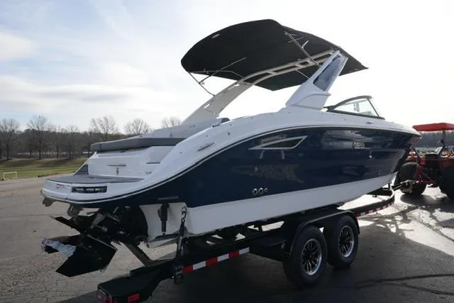 Slide: The Image of 2025 Sea Ray SDX 270 boat on trailer, featuring sleek design and modern amenities. - 5