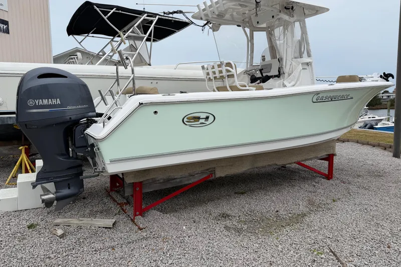 Slide: The Image of 2016 Sea Hunt Ultra 234 boat with Yamaha outboard engine on display. - 10