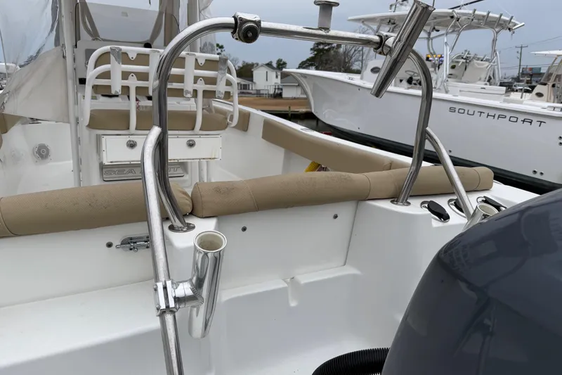 Slide: The Image of 2016 Sea Hunt Ultra 234 boat console with Garmin navigation and communication equipment. - 14